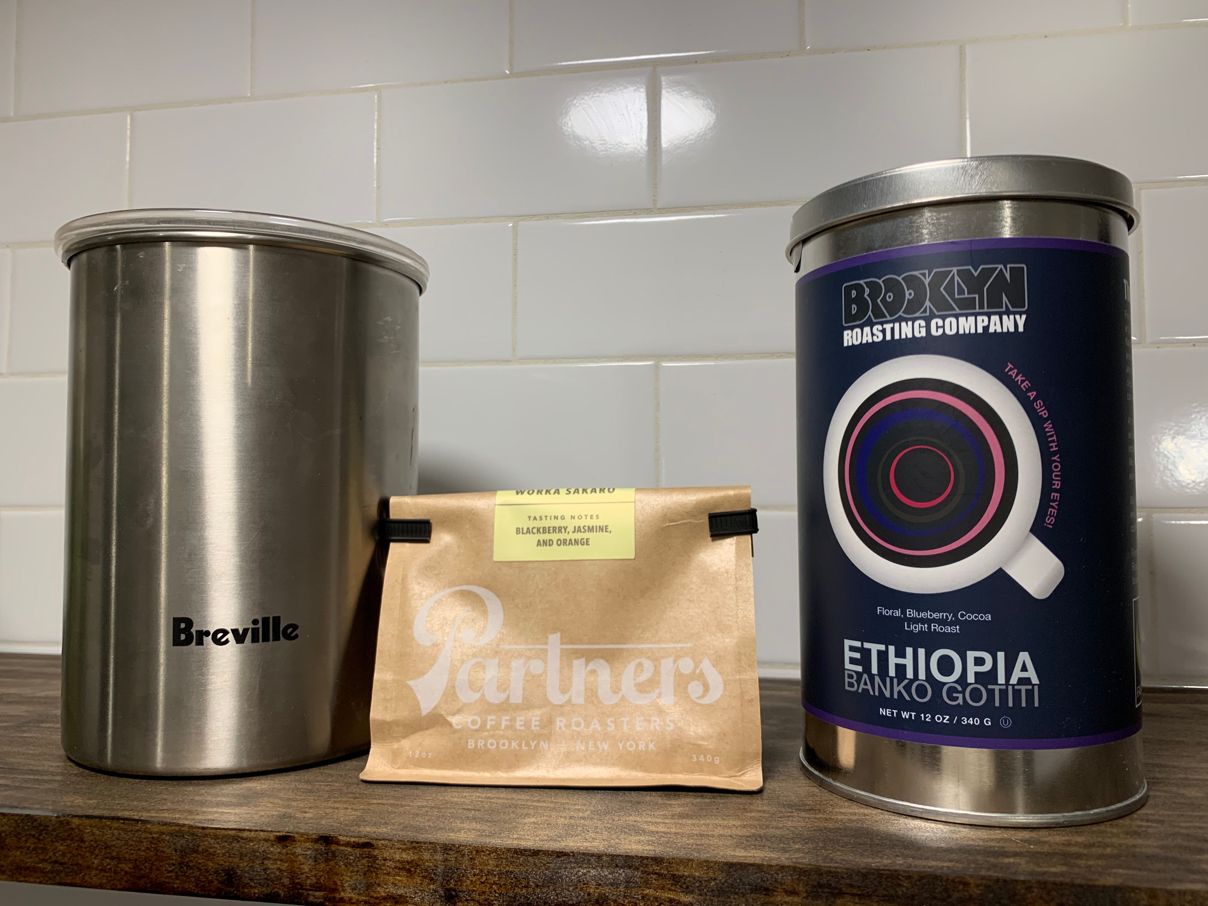 An airtight Breville "Bean Keeper," Partners Coffee Roasters' Worka Sakaro Ethiopian Roast, and Brooklyn Roasting Company's Banko Gotiti Ethiopia Roast