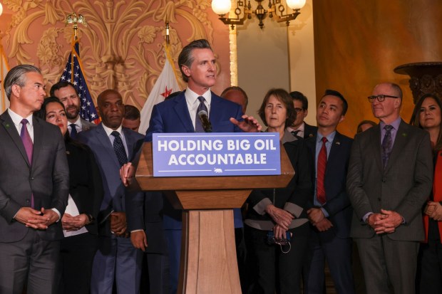 Gov. Gavin Newsom announces the signing of Senate Bill X1-2 to Democrats in the Legislature in Sacramento on March 28, 2023. The bill requires California refineries to submit more data to state authorities and creates the Division of Petroleum Market Oversight. (California Governor's Office)